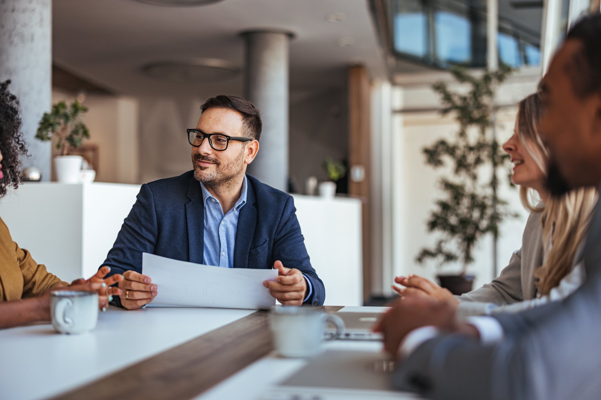 Business meeting and strategy discussion in modern office